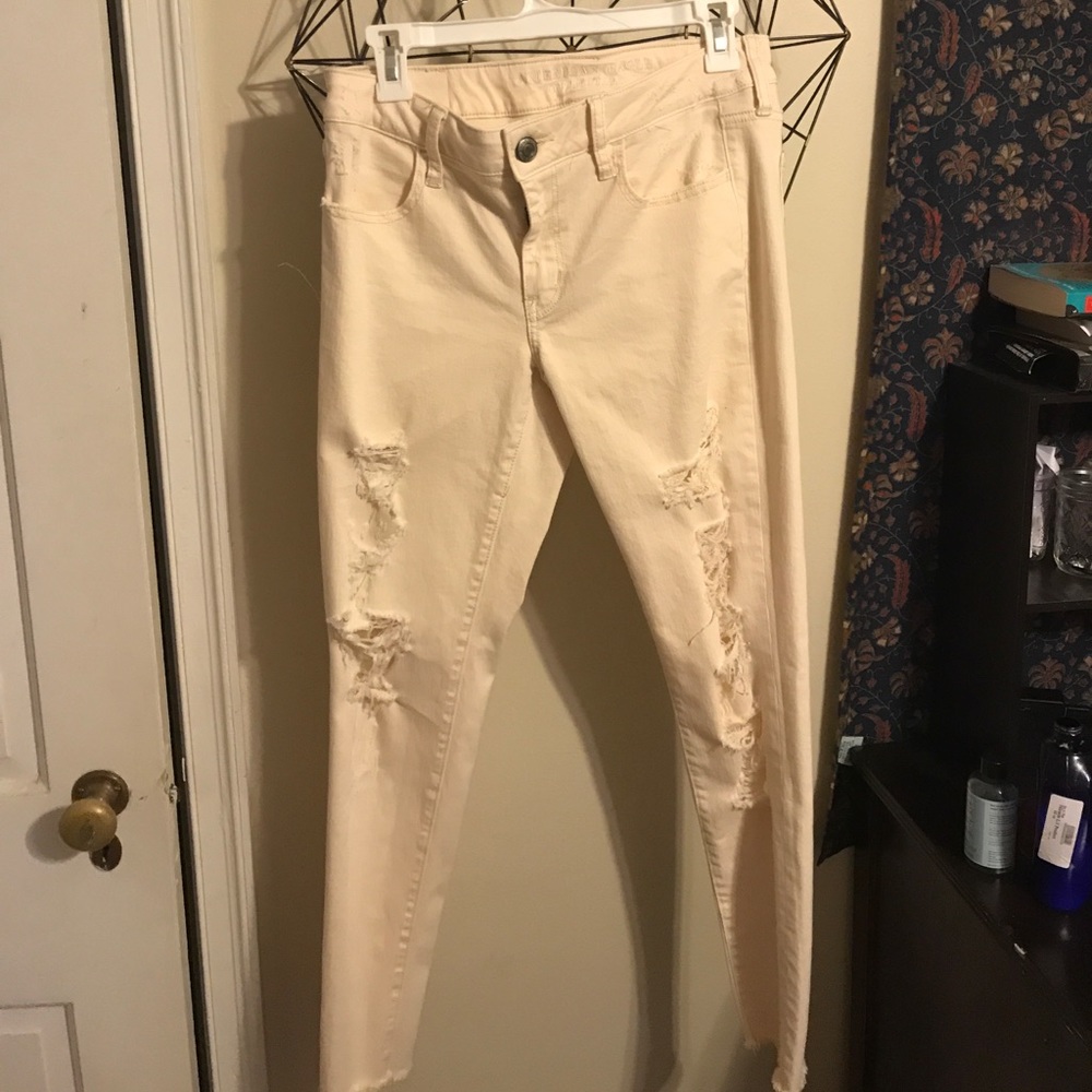 Cream Ripped American Eagle Jeans